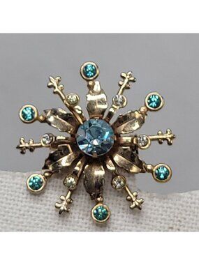 Vtg Rhinestone Snowflake Starburst Brooch Pin Gold Tone Blue & Clear Stones 1.5"